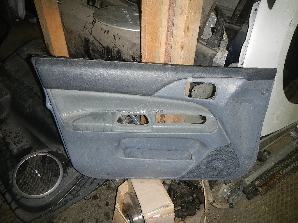 Обшивка двери передней левой AP-0000411644